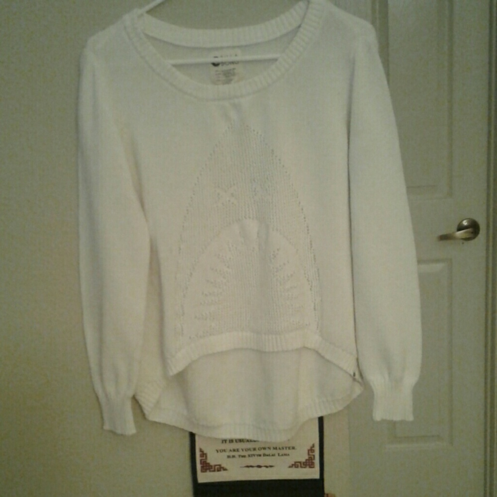 Cream colored Billabong sweater. It is a large but